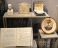 Vichy France leader Marshal Pétain ceramic commemorative items & document defining Vichy Jewish draft status laws in collaboration with Germans at Caen Memorial. Caen, France.