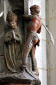 Sculpture of Bishop being beheaded at Amiens Cathedral. Amiens, France.
