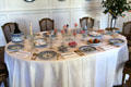 Table set with Rouen-made pottery at Rouen Ceramic Museum. Rouen, France.