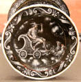 Mercury on a cart being pulled by roosters enamel paint on copper by Jean Court from Limoges at Angers Fine Arts Museum. Angers, France.