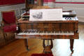 Erard Rio rosewood covered grand piano in Music room in Royal Lodge at Chateau Royal of Amboise. Amboise, France.