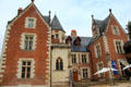 Red brick trimmed with white tufa façade of Château de Clos Lucé. Amboise, France.