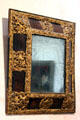 Antique mirror set in highly ornate filigree frame at Château de Clos Lucé. Amboise, France.