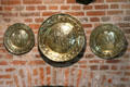 Embossed metal plates hanging on kitchen wall at Château de Clos Lucé. Amboise, France.
