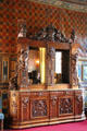 Carved dining room oak sideboard at Cheverny Chateau. Cheverny, France.