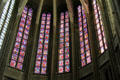 Stained glass windows with church history at Orleans Cathedral. France.