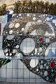 Tile mural of film history in park between metro station & Lumière Museum. Lyon, France.
