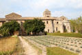 Former monastery building over garden at Saint-Paul Asylum. Saint-Rémy-de-Provence, France.