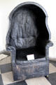 Chair with wings to keep away drafts at Castletown House. Ireland.