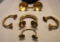 Hoard of gold dress fasteners & bracelets from New Ross at National Museum of Ireland Archaeology. Dublin, Ireland.