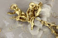 Gilded cherubs of sculpted ceiling in council of state room at Aras an Uachtarain. Dublin, Ireland.
