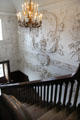 Sculpted stairwell walls & chandelier at Russborough House. Ireland.