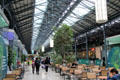 Ground level recreation hub in CHQ building, repurposed for Irish Emigration Museum. Dublin, Ireland.