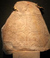 Grave slab with square cross at Clonmacnoise museum. Ireland.