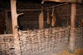 Interior of recreation of Neolithic straw house at Irish National Heritage Park. Ireland.