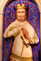 Modern carving of Medieval king with falcon in gallery displaying Museum of Treasures' Great Charter Roll. Waterford, Ireland.