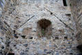 Interior wall with deeply inset window & old roof line at Desmond Castle. Adare, Ireland.