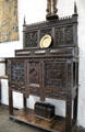 Ornate carved wooden cabinet in Great Hall at Bunratty Castle. County Clare, Ireland.
