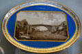 Vienna porcelain platter painted with first iron bridge near Coalbrook-Dale, England at Pitti Palace Ceramics Museum. Florence, Italy.