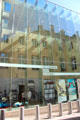 Modern glass facade of Lëtzebuerg City History Museum in historic core of city. Luxembourg, Luxembourg.