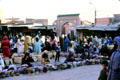 Women knitting caps for sale in souk. Marrakesh, Morocco.