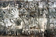 Mayan glyph of priest with sword decapitating losers of ball games at Chichén Itzá. Mexico.