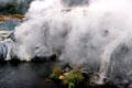 Steam rises from vents in Rotorua. New Zealand.