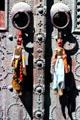 Islamic puppets hung on door handles in Medina. Tunis, Tunisia.