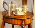 Silver teapot by Patrick Robertson of Edinburgh with porcelain tea cup & jar at City Art Centre. Edinburgh, Scotland.