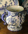 Tin-glazed earthenware posset pot in Georgian room at Gladstone's Land tenement house. Edinburgh, Scotland.