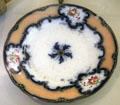 Dinner plate from Robert Louis Stevenson's Samoan house Villa Vailima at Writers' Museum. Edinburgh, Scotland.