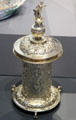 Gilt silver standing salt with figure on cover with rose maker's mark from London at National Museum of Scotland. Edinburgh, Scotland.
