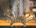 Electroplate letter or toast rack by Christopher Dresser made by JW Hukin & JT Heath of Birmingham, England at National Museum of Scotland. Edinburgh, Scotland.