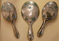 Silver hairbrush & mirror set by Jessie M. King made by WH Haseler of Birmingham for Liberty & Co. of London at National Museum of Scotland. Edinburgh, Scotland.