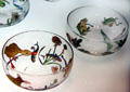 Glass fingerbowls with ducks & frogs painted by Helen Walton or Hannah Walton of Glasgow School or Art at Kelvingrove Art Gallery. Glasgow, Scotland.