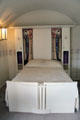 Bed under barrel arch alcove in main bedroom at Hill House. Helensburgh, Scotland