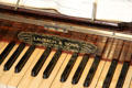 Keys of parlor piano by Laubach & Sons of Edinburgh at Tenement House museum. Glasgow, Scotland.
