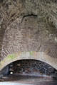 Walk-in kitchen fireplace at Doune Castle. Doune, Scotland.