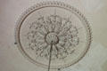 Plasterwork ceiling rose above chandelier in Library at Newhailes. Musselburgh, Scotland.