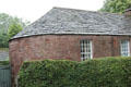 Rounded end of stone cottages at base of St Vigeans Church. Arbroath, Scotland.