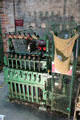 Jute cop winding machine to move thread to shuttle bobbins for weaving looms at Verdant Works Museum. Dundee, Scotland.