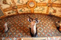 Trophy heads on wallpapered arch in Edwardian Library at Falkland Palace. Falkland, Scotland.