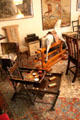 Child's chair with attached tables & rocking horse at Brodie Castle. Brodie, Scotland.