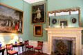 Hunting Room with mirror, fireplace & paintings at Duff House. Banff, Scotland.