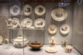Collection of Queen's Ware plates & vessels transfer-printed in black or red by Wedgwood at World of Wedgwood. Barlaston, Stoke, England.