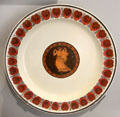 Queen's Ware Etruscan pattern red & black transfer-printed plate by Wedgwood at World of Wedgwood. Barlaston, Stoke, England.