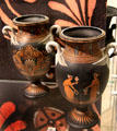 Black Basalt vases with swan handles & encaustic enamel by Wedgwood at World of Wedgwood. Barlaston, Stoke, England.