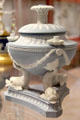 Wedgwood blue jasper tripod lamp standing on three dolphins after design by Lady Templetown at World of Wedgwood. Barlaston, Stoke, England.