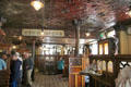 Interior of with snugs for privacy at right Crown Liquor Saloon. Belfast, Northern Ireland.