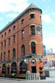 Flat iron building with Bittles Bar at Victoria Square. Belfast, Northern Ireland.